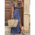 Vestido largo bohemio con cuello en V y estampado elegante, ideal para verano. - S / Azul