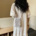 Elegant white macrame woven crossbody phone bag with beads for beach vacation style - White