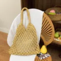 Yellow hand-woven cotton rope tote bag with hollow macramé design and drawstring liner - Yellow