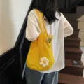 Yellow mesh hollow-out tote bag with white flower decoration for summer vacation - Yellow