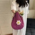 Purple summer hollow mesh tote bag featuring a large white crochet flower charm - Purple