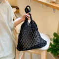 Black cotton rope hollow woven handmade tote bag with white drawstring inner pouch - Black