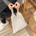 Elegant handmade off-white hollow woven cotton rope tote bag for beach and casual summer use - White