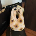 Elegant handmade crochet underarm bag featuring vibrant yellow sunflower patterns - Single Bag / Flower Style
