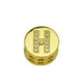 Close-up of a gold-plated round charm with a crystal-encrusted letter H and heart cuts - Style H / Pendant Only (Without Chain)