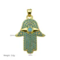 Vista detallada del colgante mano de Fátima dorado con piedras azules y ojo turco 34mm - Estilo Mano de Fátima (DN260504-G) - Colgante Solo (Sin Cadena)
