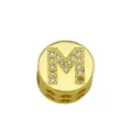 Detailed view of a polished gold circular charm bead with micro-pave letter M design - Style M / Pendant Only (Without Chain)