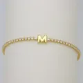 Close-up of gold tennis bracelet with sparkly cubic zirconia and puffy letter M charm. - Letter M (DB260303-M)