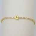 Gold tennis bracelet featuring a cute puffy balloon letter Q pendant set with sparkling cubic zirconia. - Letter Q (DB260303-Q)