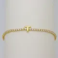 Gold tennis bracelet with puffy balloon letter T charm and sparkling cubic zirconia stones. - Letter T (DB260303-T)