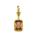 Detailed close-up of a rectangular colored cubic zirconia pendant in 18k gold plated copper. - Orange