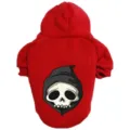 Close-up detail of the spooky skull graphic printed on the red pet hoodie back design. - XS / Halloween Skeleton - Red
