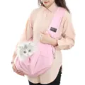 Detailed view of the pink pet sling bag, featuring soft fabric and adjustable strap for pets. - One Size / Pink