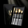 Stainless steel flatware set in gold and white with gift box, 4-piece cutlery variant. - White & Gold 4-Piece Main Cutlery Set in Color Box