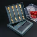 Creative stainless steel fruit fork set with flower shape design for desserts and pastry. - 4-Piece Flower Fork Set (Green Box) / Titanium Gold