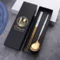 Stainless steel 18-10 cutlery set with chopsticks and spoon in a luxury black gift box. - White and Gold Spoon and Chopsticks Set in Color Box