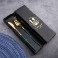 Luxury gold stainless steel cutlery set with knife and fork in elegant black gift box. - Peacock Green and Gold Knife and Fork Set in Color Box