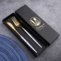 Elegant stainless steel cutlery set with gold finish white handle in luxury black gift box. - Platinum Knife & Fork Set in Gift Box