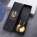 Stainless steel cutlery set with elegant green handles and luxury gold finish gift box. - Peacock Green and Gold Spoon and Fork in Color Box