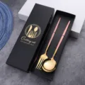 Stainless steel cutlery set with pink handles and luxury gold finish gift box packaging. - Pink and Gold Spoon and Fork in Color Box