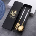 Stainless steel cutlery set with elegant white handle and glossy gold finish in gift box. - White Gold Spoon & Fork Set (Color Box)
