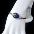 Natural gemstone adjustable braided bracelet with irregular faceted stone and gold bezel. - Lapis Lazuli