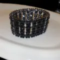 Elegantes breites schwarzes Strass-Armband mit funkelnden Kristallen für Damen Mode. - Gunmetal
