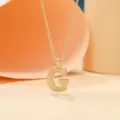 Gold-plated letter G pendant necklace, stylish minimalist fashion jewelry accessory for women. - Letter G