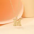 Gold-plated alloy letter M pendant necklace, elegant initial choker for women and girls daily wear. - Letter M