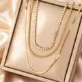 Elegant three-layered gold-tone necklace set featuring a sparkling rhinestone tennis chain - Three-layer Tennis Chain Set (N-40G) / Gold