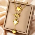 Elegante collar dorado de capas con colgantes de corazón y detalles de nácar natural - Collar Multicapa Corazón de Nácar (N-46G)