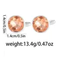 Elegant round crystal cufflinks for men and women, featuring champagne cubic zirconia. - Light Orange