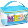 Clear PVC cosmetic bag with blue trim, top handle, and colorful embroidered MEDS letters. - MEDS / Sky Blue