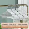 White plastic coated wire clothes hangers with non-slip hooks and multi-functional storage design. - Milk White