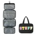 Borsa da toeletta appendibile nera con lettere STUFF colorate, astuccio da viaggio multistrato. - Nero