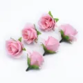 Roze kunstmatige zijden rozenbloemhoofdjes voor DIY huisbruiloft decoratie en accessoires. - Roze