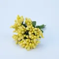 Detail shot of yellow artificial stamen berries for DIY crafts, wedding wreath and wrist flower decor. - Yellow
