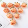 Künstliche Rosenköpfe, pfirsichfarbene Seidenblumen für DIY Handwerk, Heim- und Hochzeitsdeko. - Orange