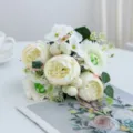 Artificial flower bouquet detail, white peony and berry arrangement, elegant home decor accent. - White