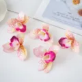 Kunstmatige film orchidee bloemhoofdjes voor taart dessert tafeldecoratie en knutselen. - Lichtroze