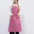 Tablier imperméable à rayures roses avec lanière de cou et poches pour cuisine boulangerie. - Mauve Clair