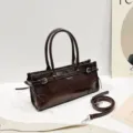 Bolso de charol marrón oscuro, elegante bolso cruzado con asas superiores y correa ajustable. - Café