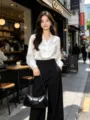 Bolso de hombro baguette de charol negro para mujer, bolso minimalista con lazo. - Negro
