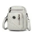 Grey washed leather crossbody cell phone bag with multi-layer zippers and quilted pocket. - Gray