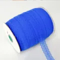 Royal blue elastic lace trim ribbon on spool for DIY crafts, bows, and gift box packaging. - Sapphire Blue