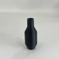Close-up detail of black plastic siphon hose shaker valve connector accessory part. - Black