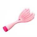 Brosse à cheveux rose flexible et démêlante, design courbé pour cheveux secs et humides. - Rose