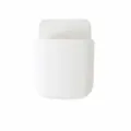 Wall-mounted storage box, white remote control holder and phone organizer, simple plastic design. - White