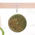 Portaspirales antimosquitos colgante de metal para un uso seguro en el hogar diario. - Soporte para espiral antimosquitos colgante dorado