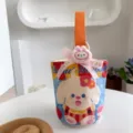 Cute cartoon canvas bucket bag for women, large capacity handbag for gifts and party favors. - Overalls Rabbit / Orange Handle